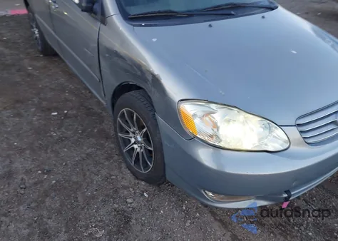 2003 Toyota Corolla Le z USA, uszkodzony, nr VIN 1NXBR32E73Z039721